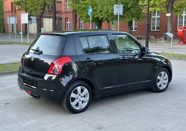 Suzuki Swift cena 16900 przebieg: 121000, rok produkcji 2009 z Gniezno małe 497